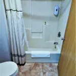 view of a bathroom with a bath tub