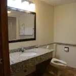 handicap toilet with grab bars